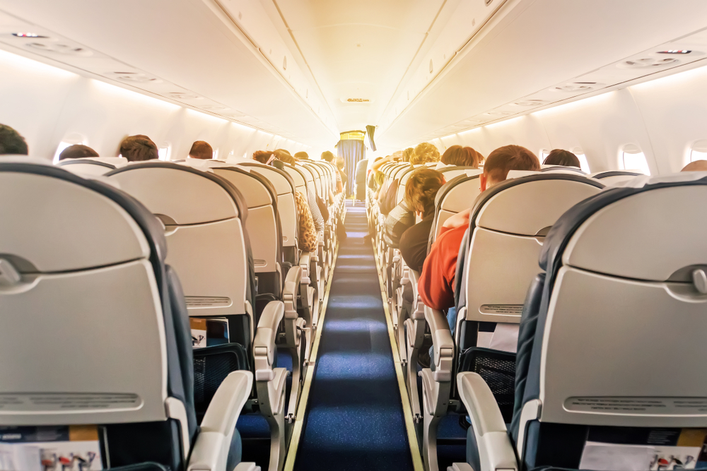 Passengers seated inside an aircraft