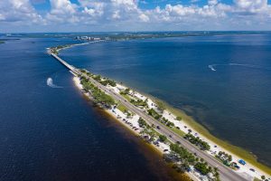 Drone angle view of Sanibel Island Causeway that connects Sanibel Island to Fort Myers, Florida.
