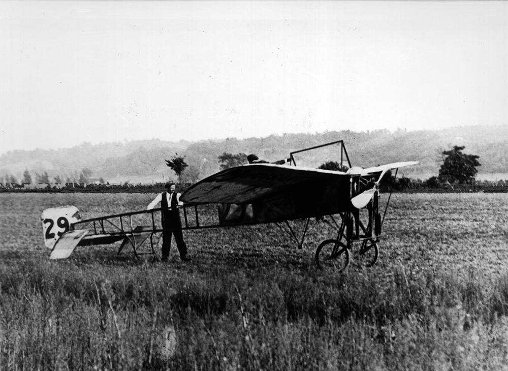 Historic plane in field